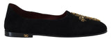 Mocassini slip-on Dolce & Gabbana in camoscio nero con croce dorata