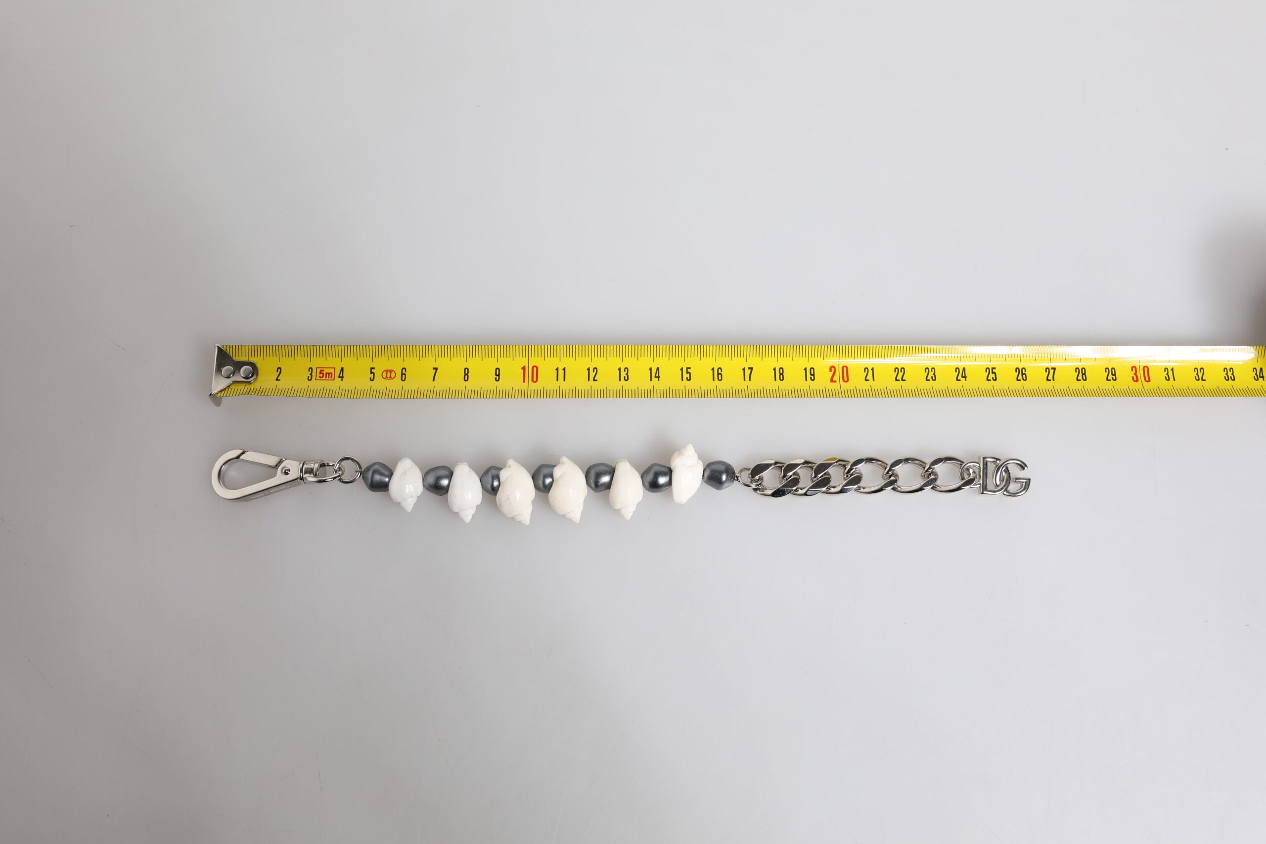 Silver Tone Brass Beaded Shell DG Logo Pendant Bracelet