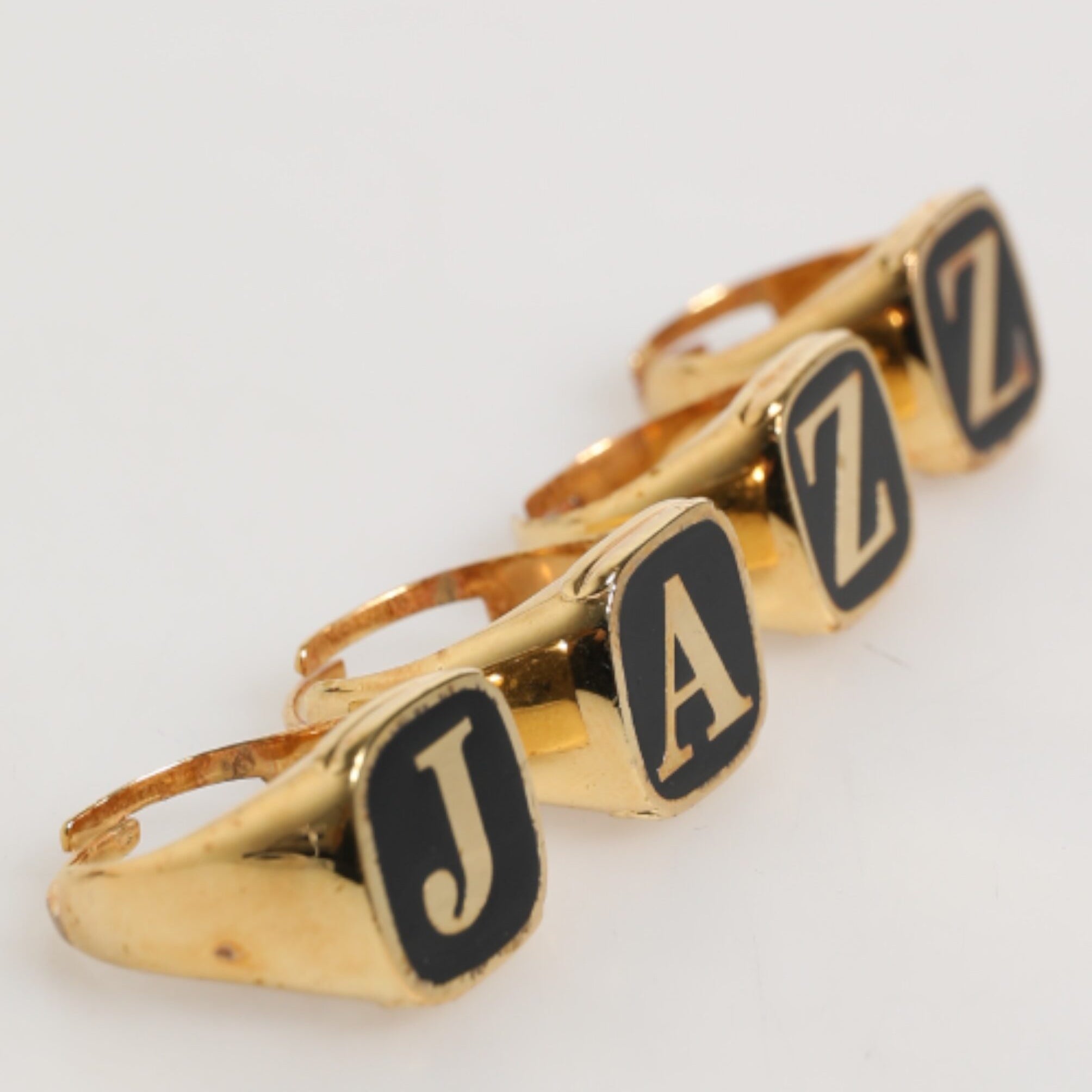 Dolce & Gabbana Gold Tone Brass JAZZ Letter Set 4 Pieces Adjustable Ring Dolce & Gabbana